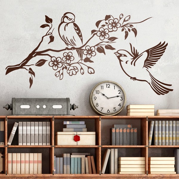 Sticker mural Paire d'oiseaux sur la branche et des fleurs